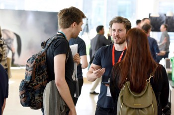  BA Games Art student Jack Hanna talking to Animation Director Dan Cripps & Lead Compositor Elena Fiorin 